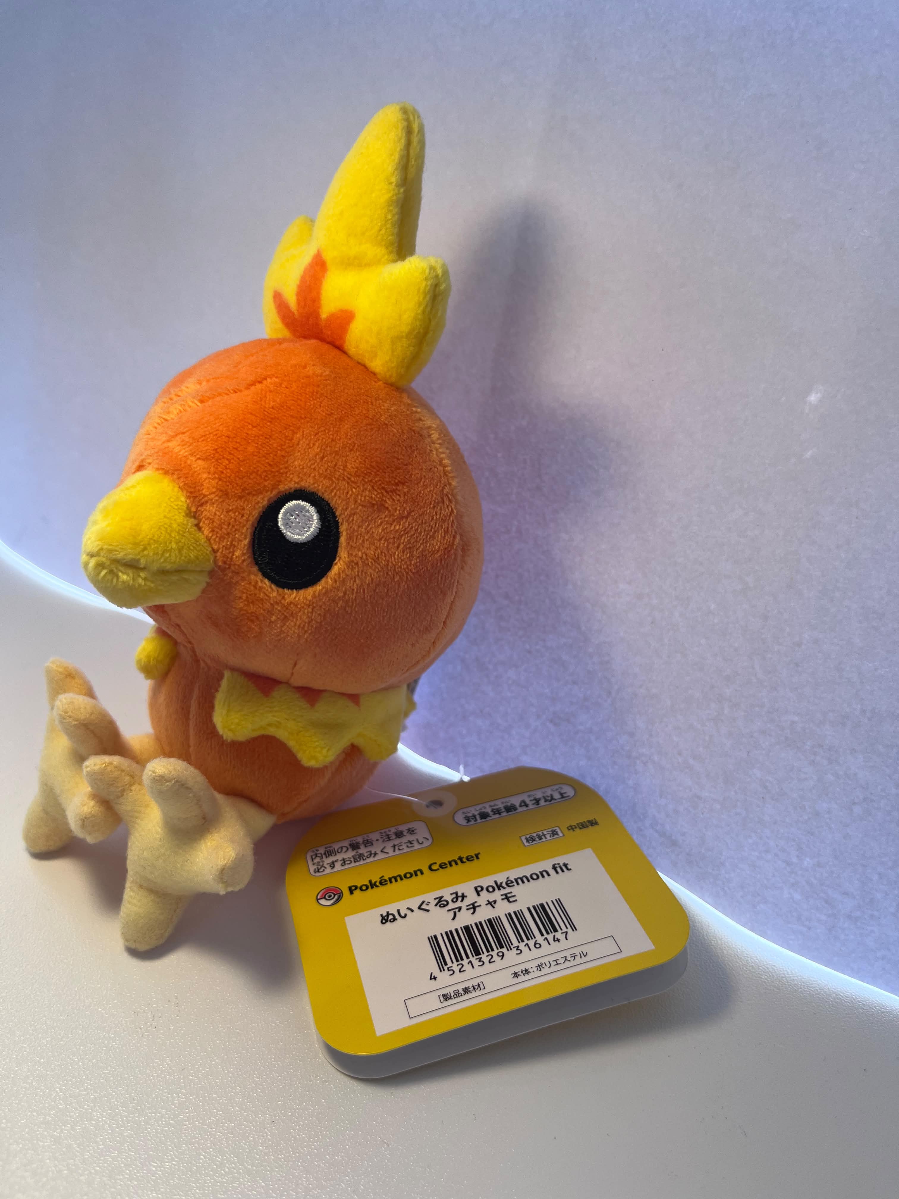 Peluche Torchic Pokémon Center oficial 16cm